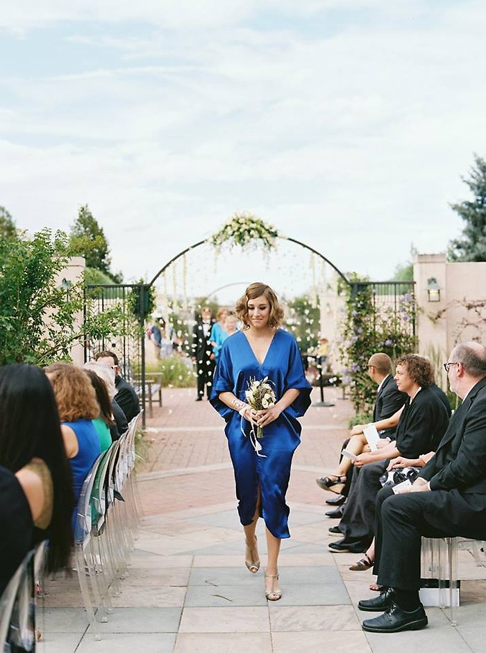 Arch and bridesmaid